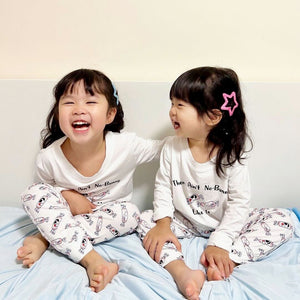 cute sisters in the wee bean organic bamboo sleepwear in bunny rabbit candy