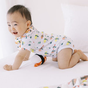 baby crawling in the wee bean organic cotton onesie bodysuit romper in sushi